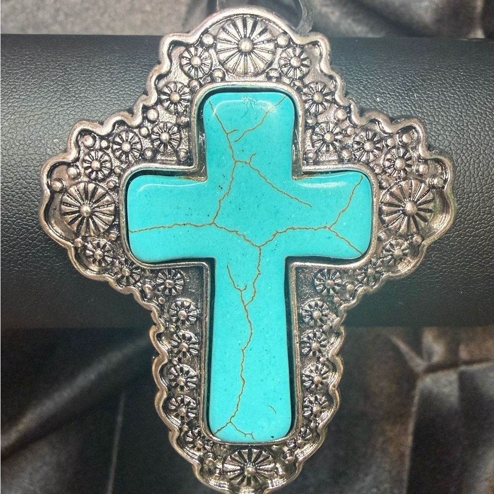 NWT Faux Turquoise and silver tone cross bracelet.  Adjustable cuff.